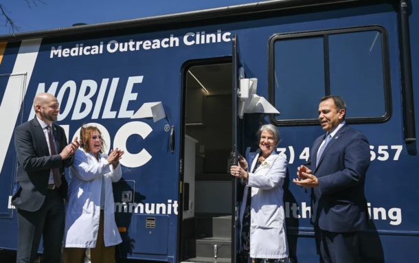 Tennessee Department of Disability and Aging Commissioner Brad Turner, left, Dr. Kristi Wick, Dr. Chris Smith and Tennessee Department of Health Commissioner Ralph Alvarado at the ribbon-cutting ceremony for MobileMOC on Tuesday, March 25, at the Rhea County Welcome Center in Dayton, Tennessee.